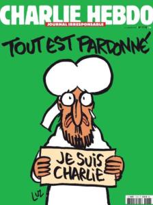 Tout est pardonné - Alles is vergeven. Op de afbeelding is Mohammed te zien die een bordje vasthoudt met ' Je suis Charlie' erop. 